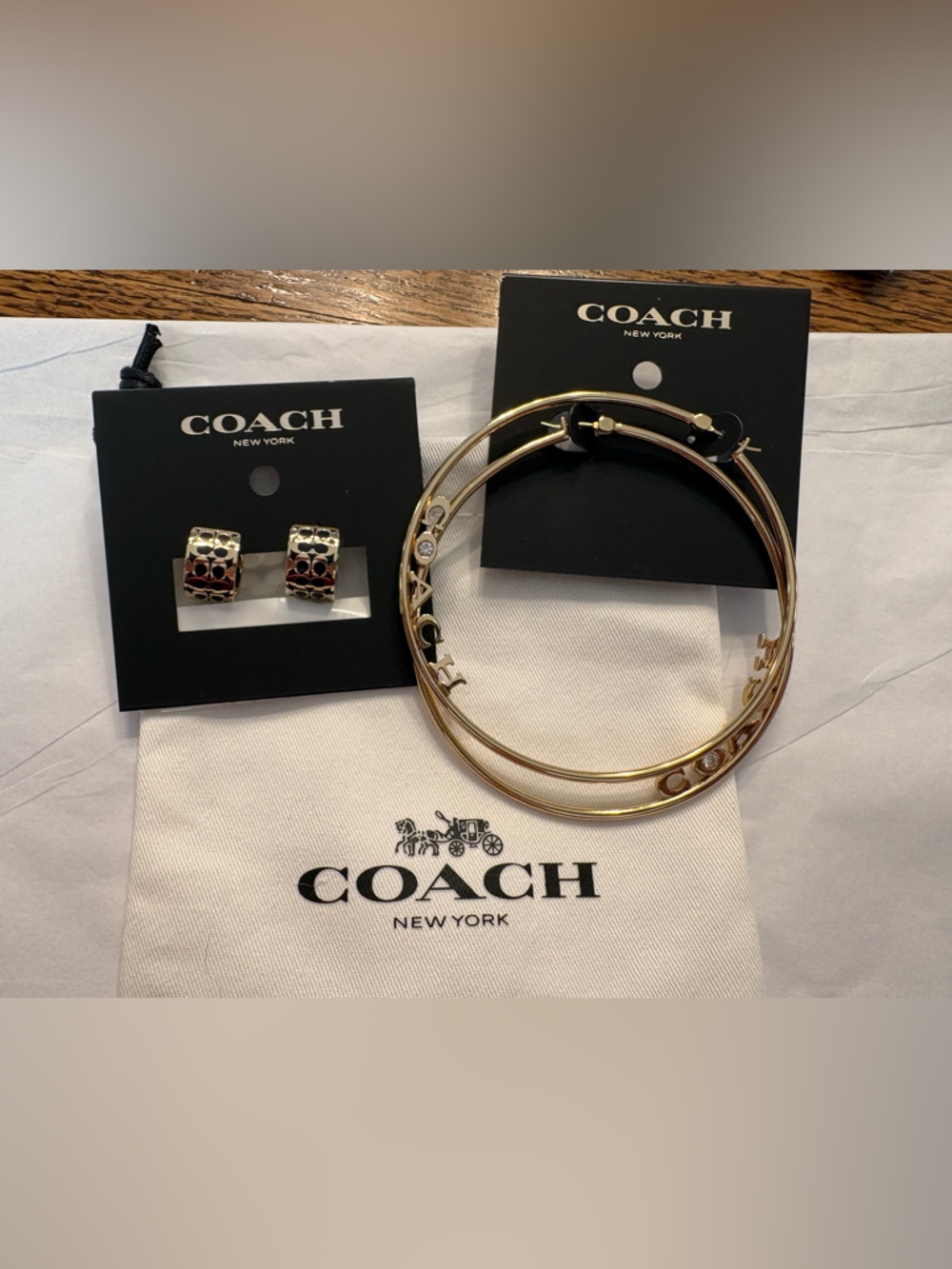 Coach Gold-tone Bracelet Stack with Gold Hoop Earrings
